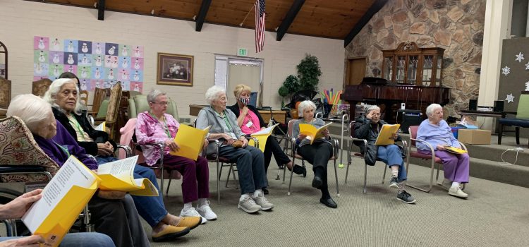 Clients singing together at Aspen Senior Day Center