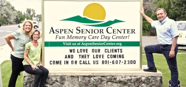 Gary, Julie, and Pam with Aspen Senior Day Center Sign
